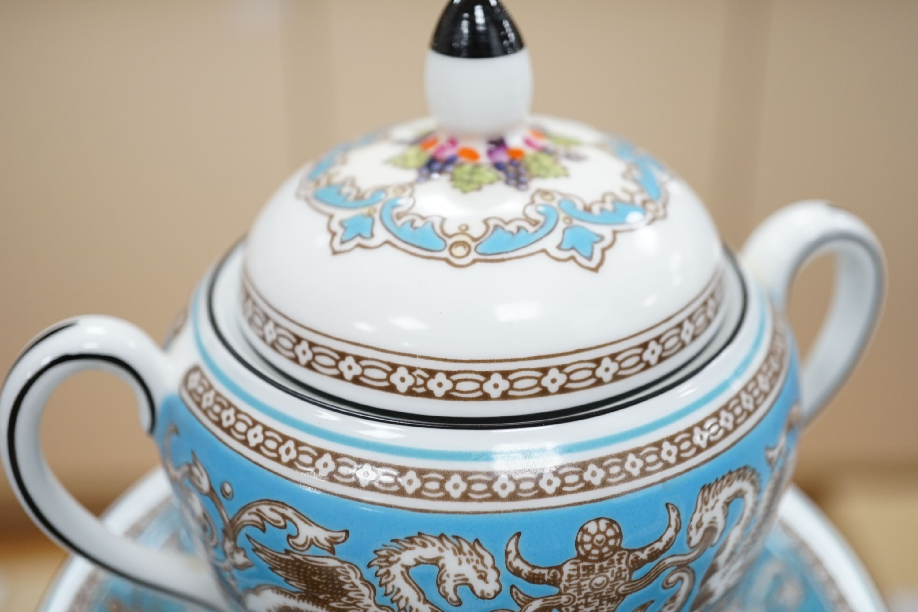 A Wedgwood Florentine coffee and dinner wares and a silver salt